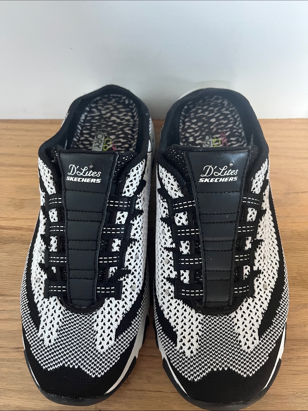 Skechers D'Lites Men's Slip-On Athletic Sneakers in Black and White